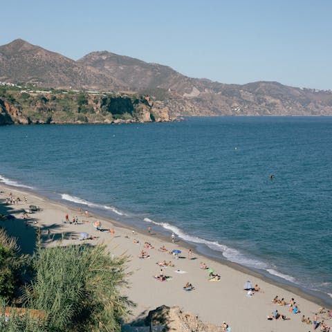 Spend leisurely days relaxing on Playa de Huelin, just steps away