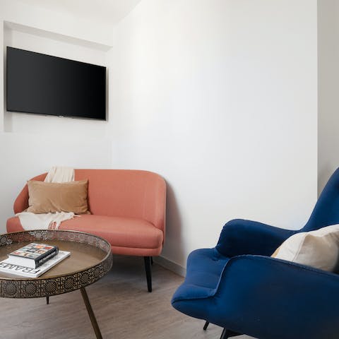 Curl up with a morning cuppa in the apartment's sitting area, there's a coffee pod machine at the ready