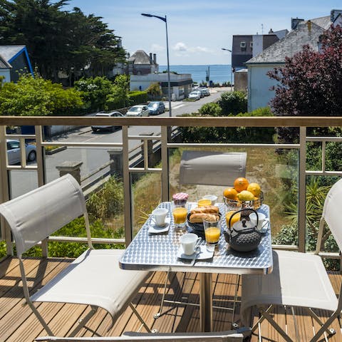 Bite into a delicious snack while you savour the sea views