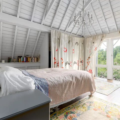 Wake up to valley views in the rustic, Scandinavian-style bedrooms