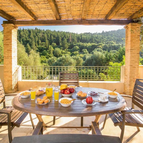 Eat breakfast while gazing out over the forests near Fiskardo