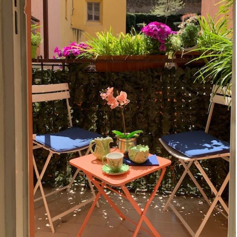 Take your morning espresso on the tiny terrace in the sun