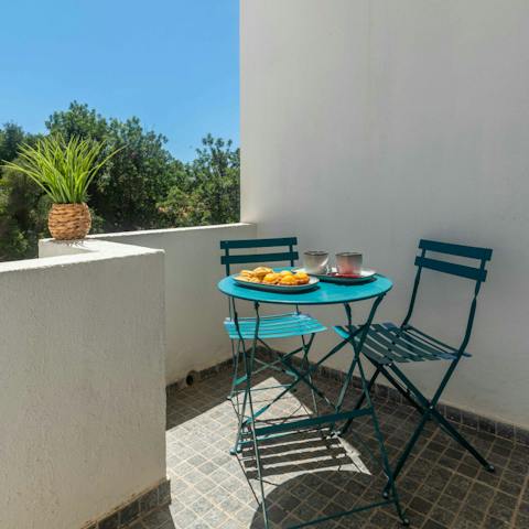 Enjoy your breakfast alfresco on the sunny balcony