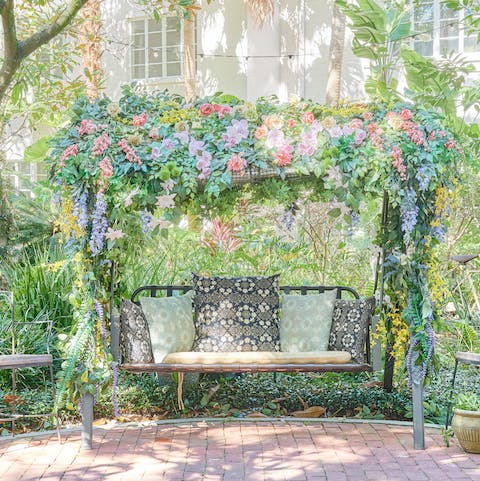 Soak up the Floridian sunshine in the pretty communal garden filled with beautifully-scented flowers