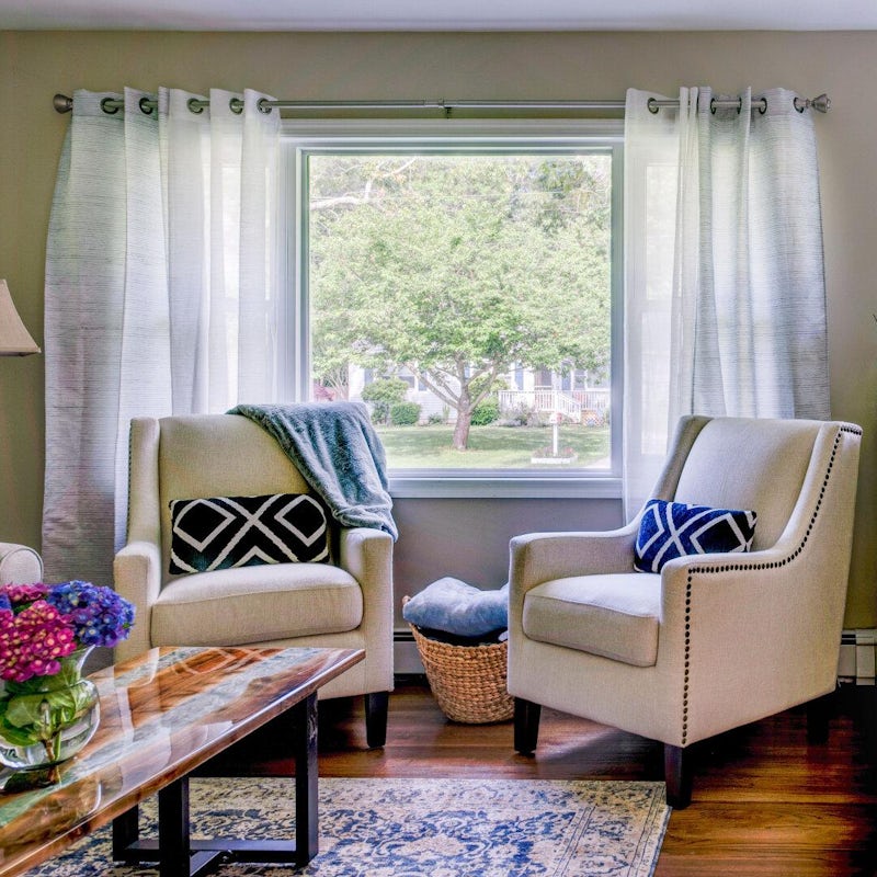 Pour a glass of wine and get comfy in one of the armchairs