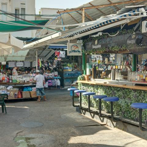Wander through the stalls at Carmel Market to find a bargain