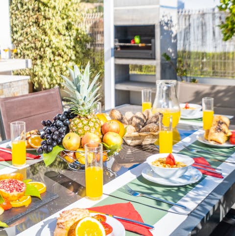 Begin the day with fresh-squeezed OJ on the terrace