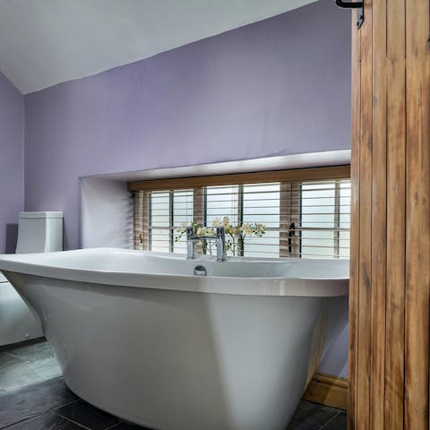Soak away the evening in the freestanding bath, there's room for two