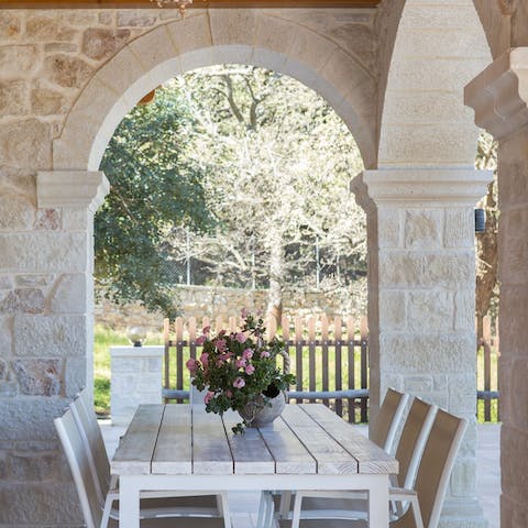 Sip your morning coffee under the arches of the pretty patio
