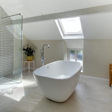 Take a long, relaxing bath in the deep standalone tub after days of exploring and walking