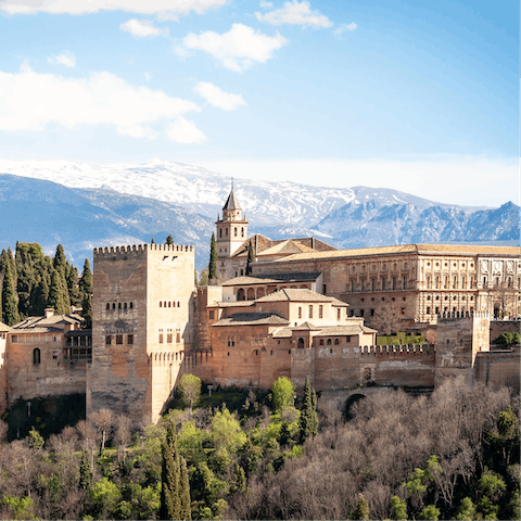 Spend an afternoon exploring the Alhambra of Granada, a fifteen-minute car ride away