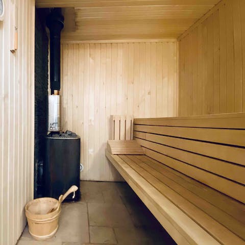 Enjoy a restorative session in the home sauna 