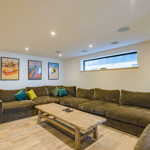 Cosy up on the sofas with some popcorn in the cinema room, and enjoy a movie 
