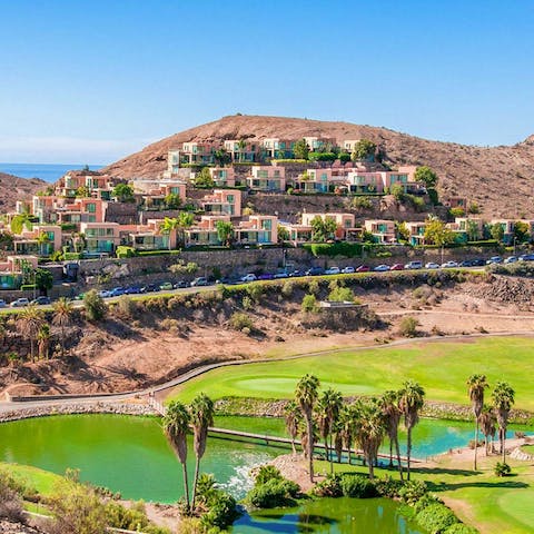 Spend leisurely days on the Salobre Golf Course, a ten-minute walk away
