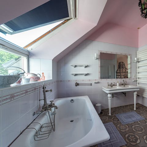 Treat yourself to a soak in the tub right in the bedroom