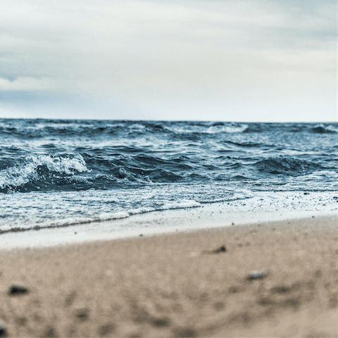 Drive minutes away and spend the day in the soft sand of Plage du Kérou