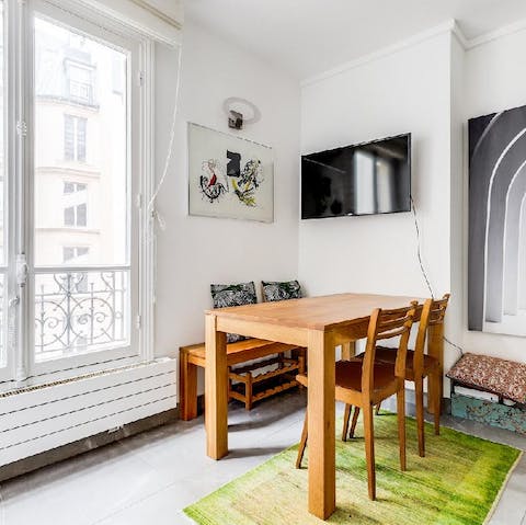Start mornings over fresh coffee and croissants while enjoying Juliet balcony views of Saint-Germain-des-Prés