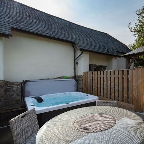 Treat yourself to a soak in your private hot tub