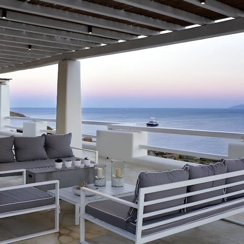 Take in the stunning Mykonos sunsets from myriad outdoor lounges