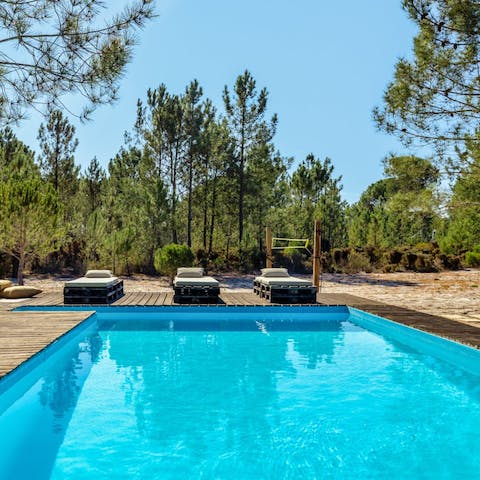 Enjoy a refreshing dip in the private outdoor pool or relax on a sun lounger