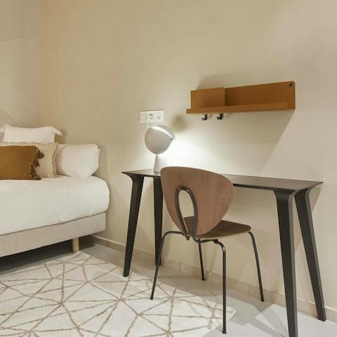 Find a quiet spot to catch up on work at the desk