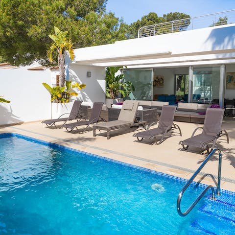 Spend sun-soaked days lounging by the private pool