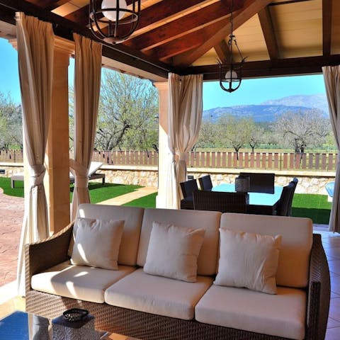 The home is situated in a secluded, rural setting with stunning views of the mountains.