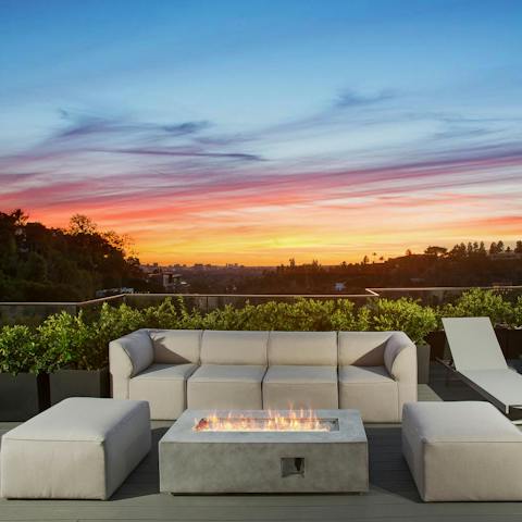 Sit around the fire pit with a glass of pinot noir to start the evening