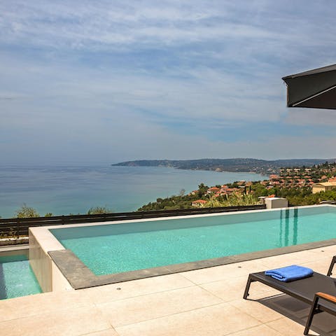 Gaze out to sea views from your private infinity pool