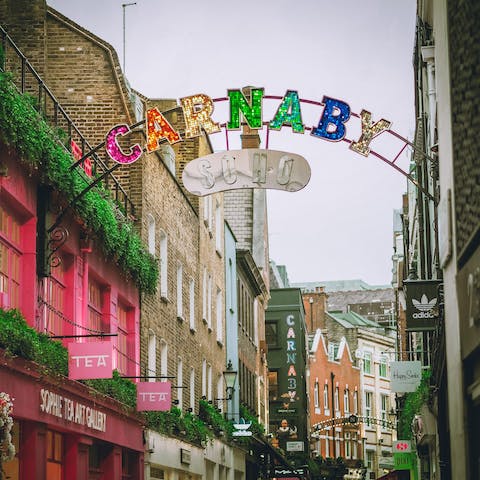 Treat yourself to a shopping spree along Carnaby Street, a ten-minute walk away