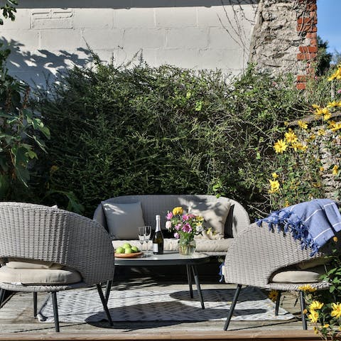 Have afternoon tea with a bottle of Prosecco in the garden