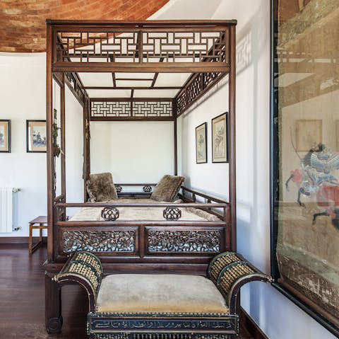 Take a siesta on the Chinese canopy bed