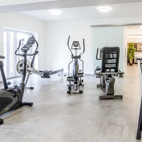 Stay on top of your fitness goals with the communal exercise room