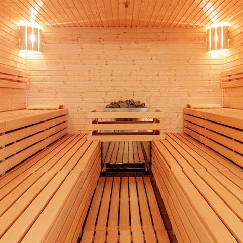 Sweat your worries away in the luxurious sauna 