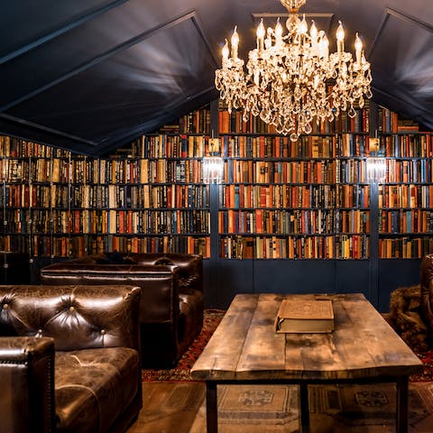 Enjoy a nightcap in the library room amid over 2,000 books