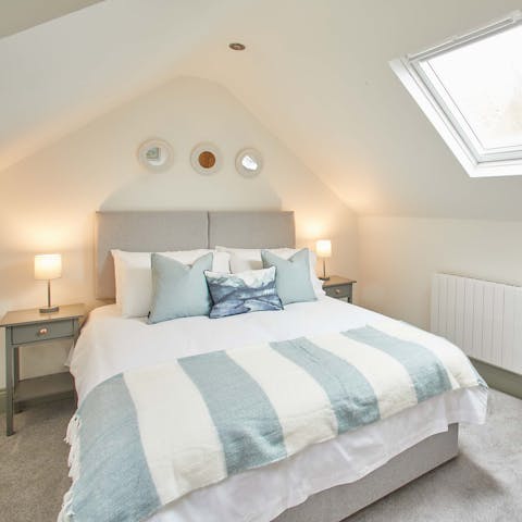 Wake up to sunlight flooding through the skylights in the main bedroom