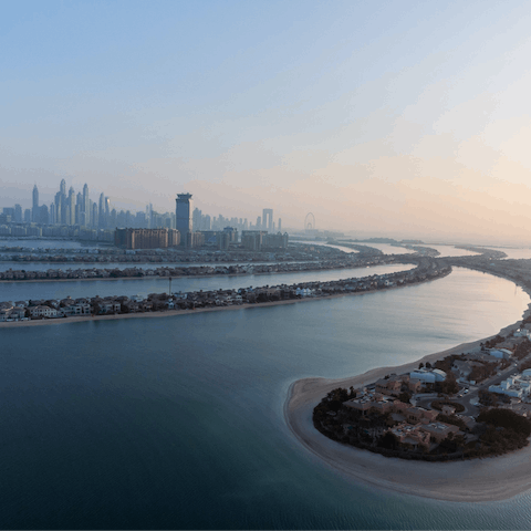 Pay a visit to the magnificent Palm Jumeirah, less than twenty minutes' drive away