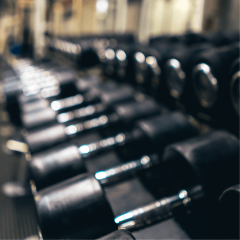 Stay on top of your fitness goals with a workout in the communal gym