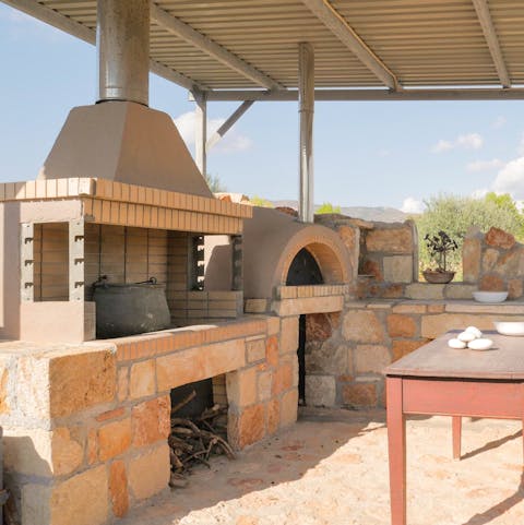 Cook authentic Greek dinners in the rustic outdoor kitchen 