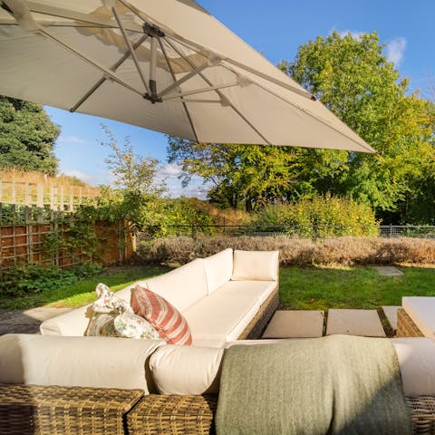 Admire views of the Chilterns Area of Outstanding Natural Beauty from the 1-acre gardens