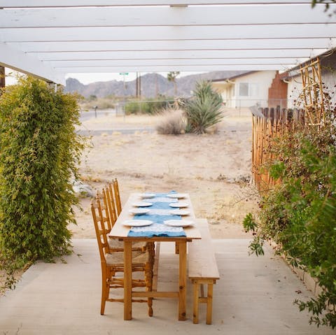 Dine alfresco under the pergola