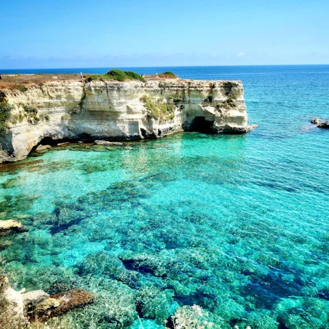 Swim the crystal clear waters from Salento, just 5km away