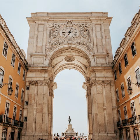 Visit the grand Praça do Comércio – it's just around the corner from your apartment