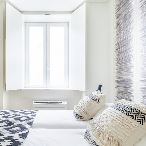 Sleep soundly in the master bedroom – inspired by the black and white mosaic pavements found throughout the city