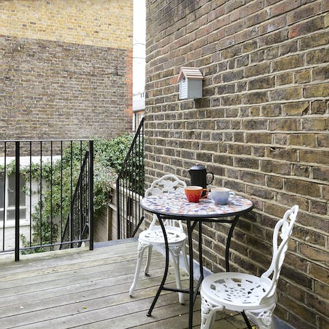 Enjoy a morning coffee on the decking off the kitchen