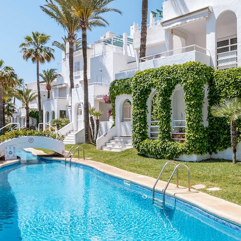 Head down for a dip in the communal pool – you won't have far to go as the balcony overlooks it!