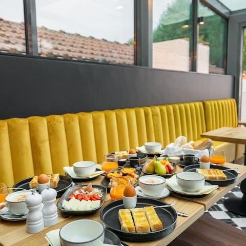 Tuck in to the sumptuous breakfast served in the orangerie