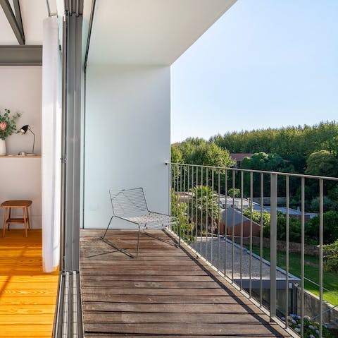 Take in the sun from your private balcony overlooking the garden