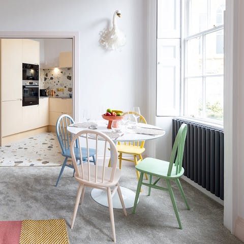 Tuck into traditional dinners of fish and chips around the colourful dining set