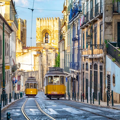Trundle through Lisbon on the iconic 28E tram – there's a stop just 100 metres from your home